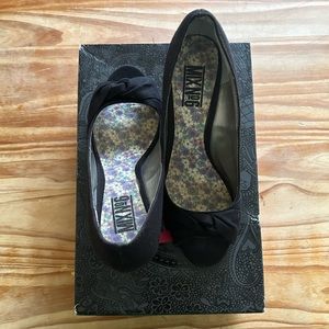 Slightly used wedge black fabric sandals